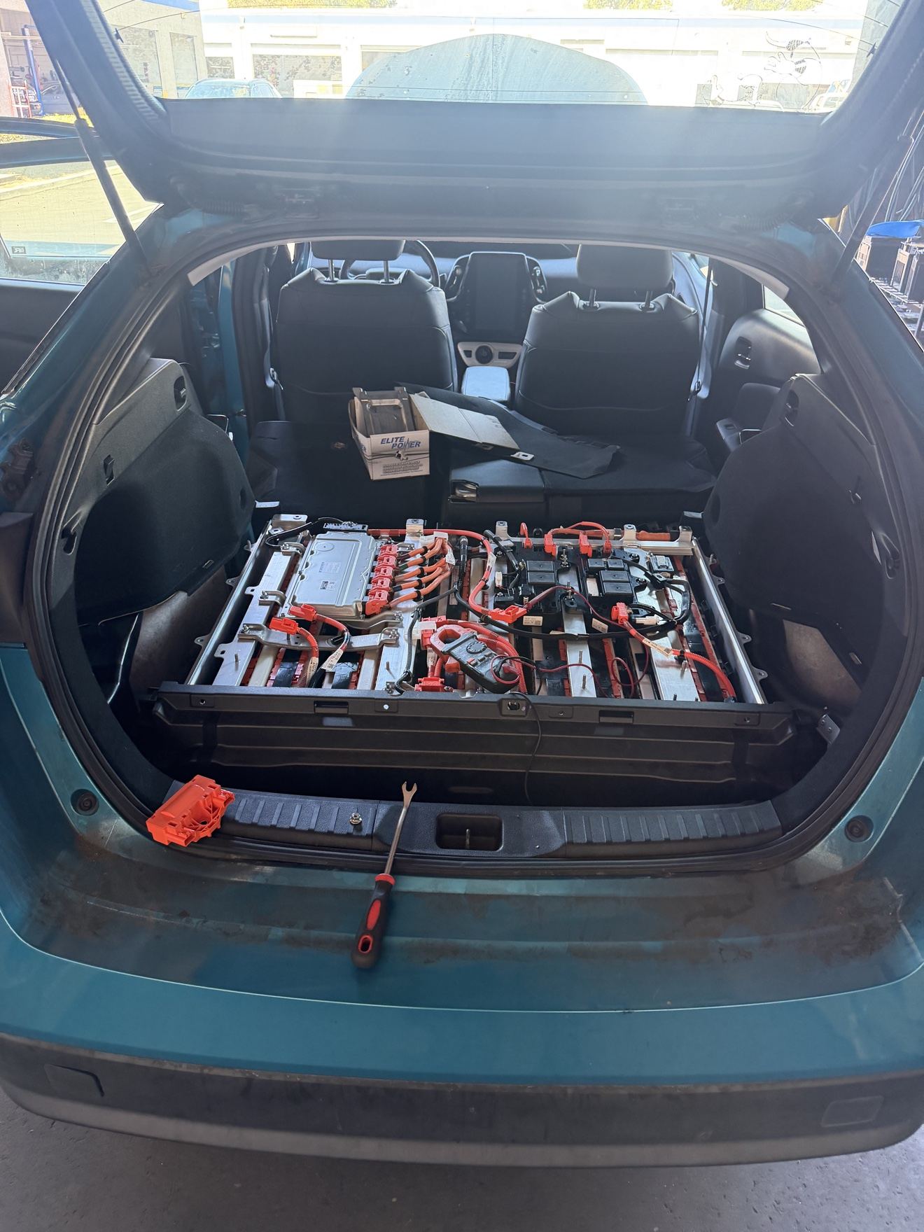 Hybrid battery pack being installed in a Toyota Prius at Certified Hybrid in Fullerton
