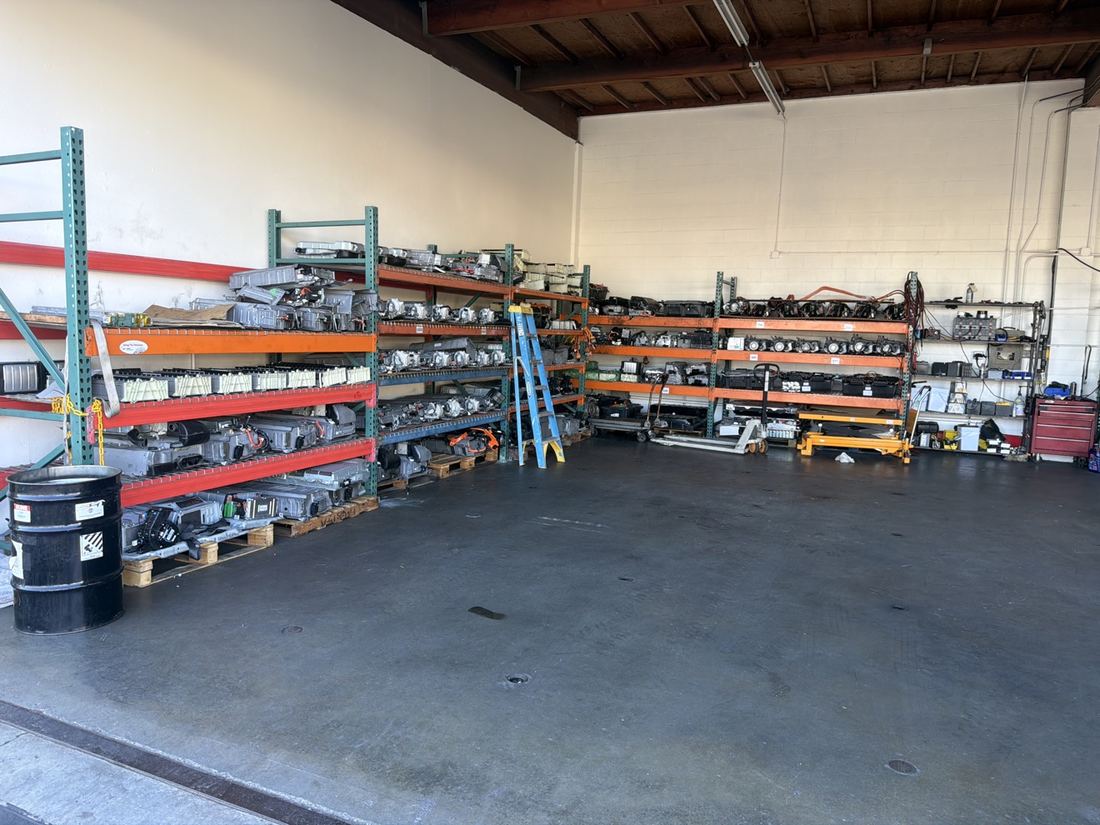 Battery inventory shelves inside the shop